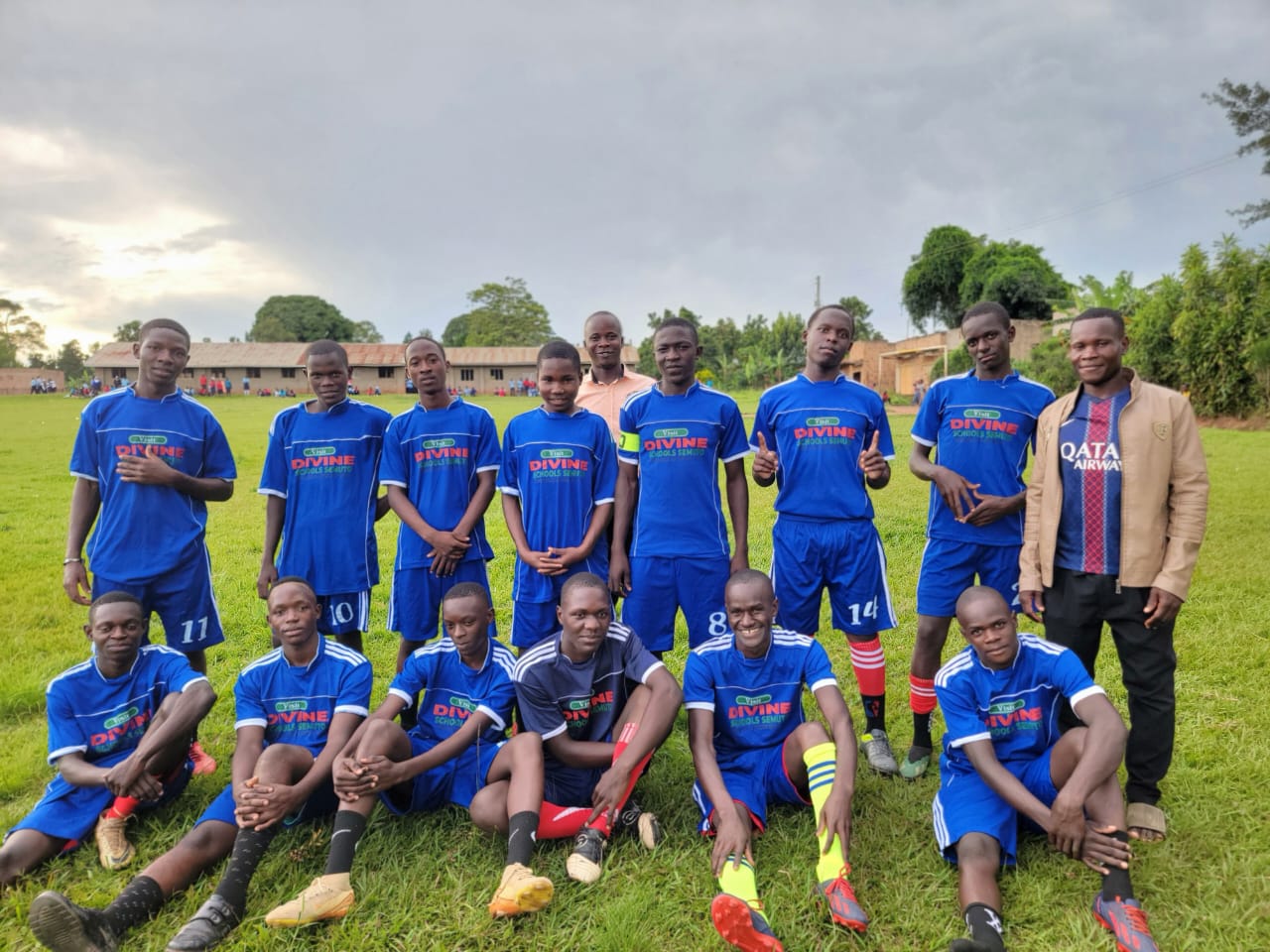 The Divine Care school football team in their blue kit
